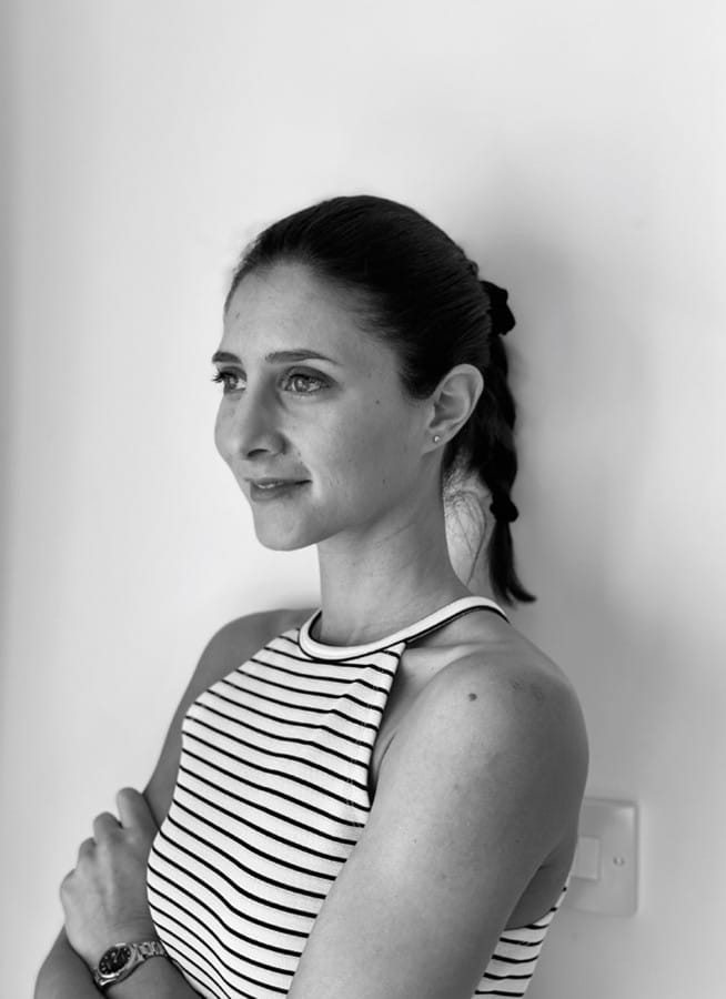 Nicole Kortesi, founder of Active Life Co., black and white portrait.